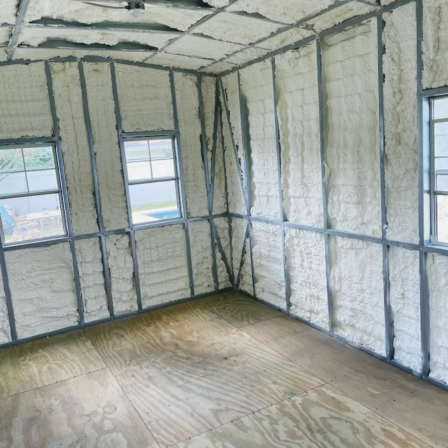 Closed-cell spray foam insulation applied to wall cavities in a residential project in Canfield